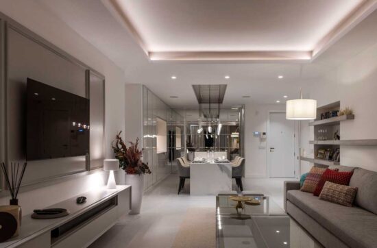 Modern open-concept kitchen with integrated dining and living areas | Kubic Design Solutions