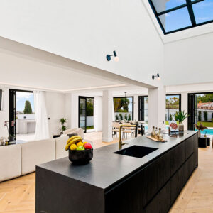 Open-concept kitchen integrated into the interior of a villa on the Costa del Sol | Kubic Design Solutions